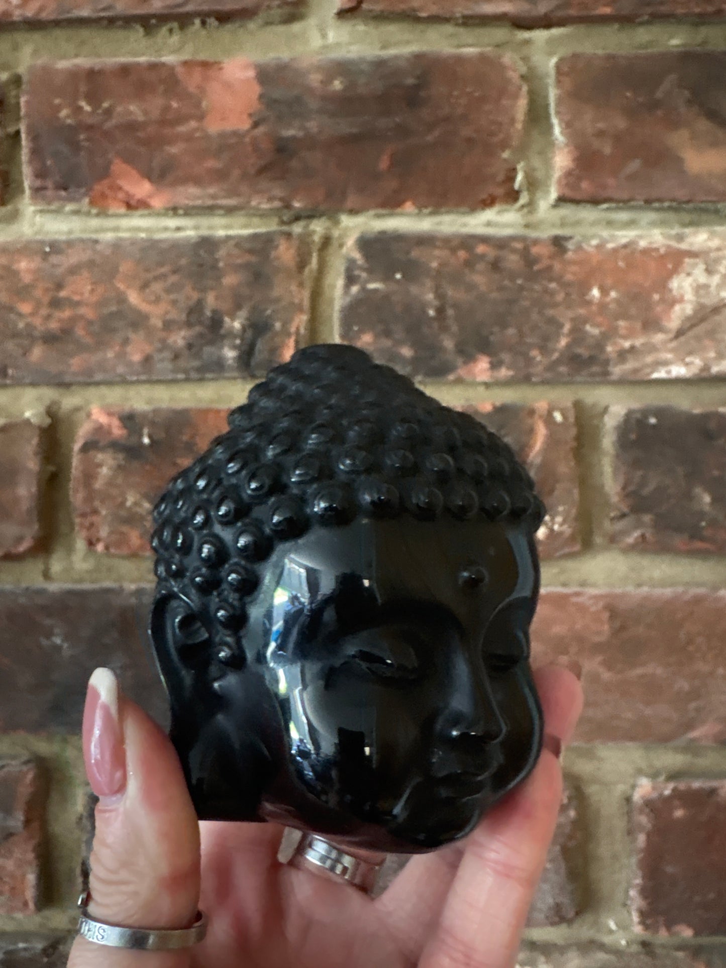 Black obsidian Buddha